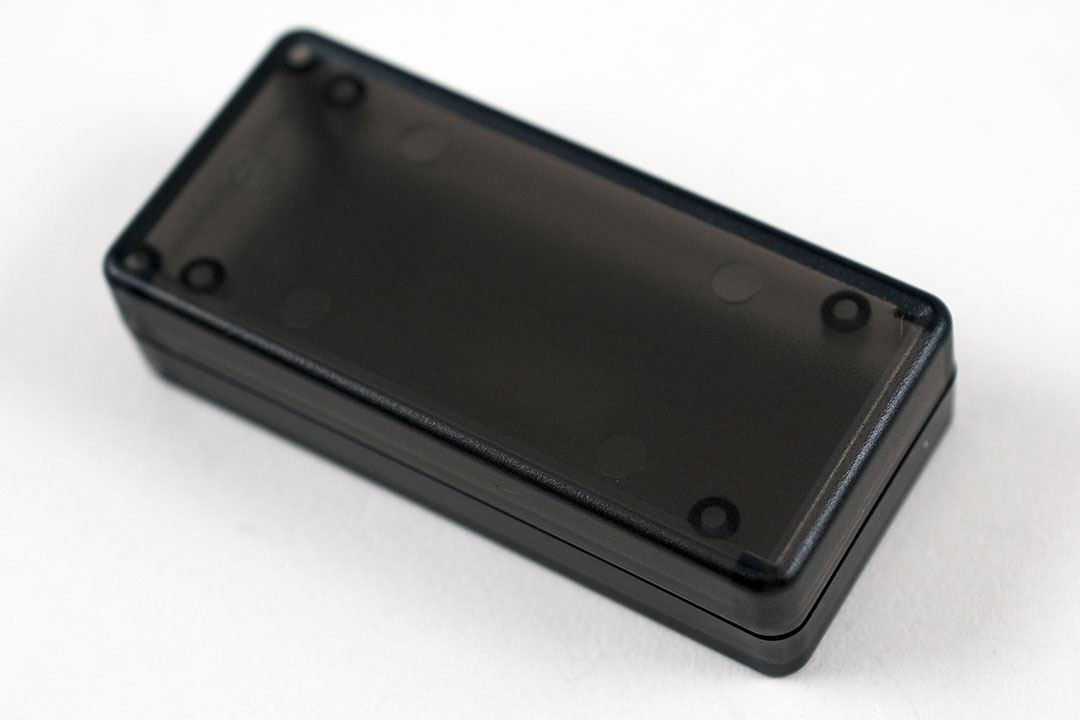 Hammond 1551 Series Smoked Translucent ABS Enclosure, IP54, Flanged, Smoked Translucent Lid, 65 x 30 x 15.5mm