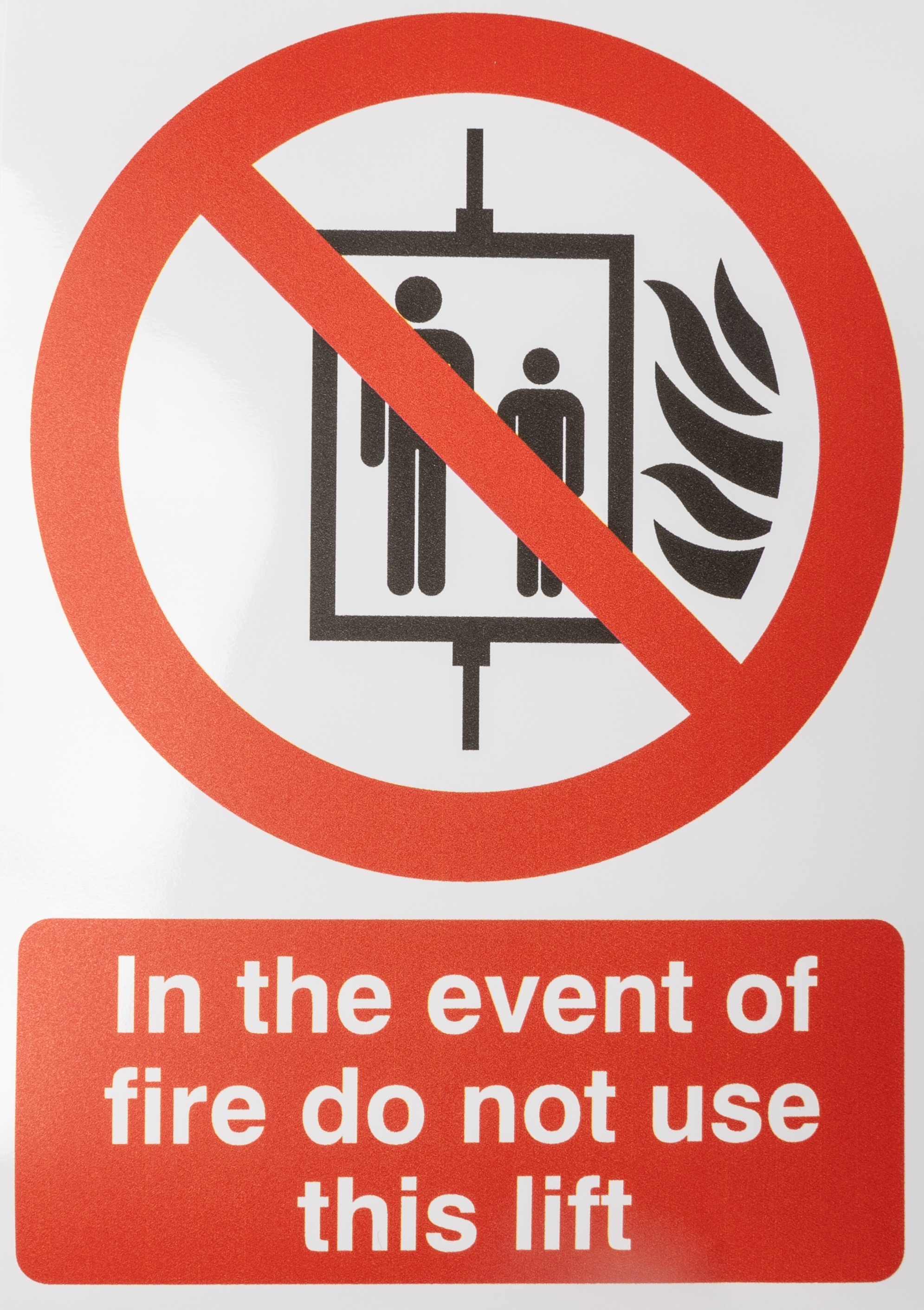 Vinyl Polyester Fire Safety Sign, In The Event Of Fire Do Not Use This Lift With English Text Self-Adhesive